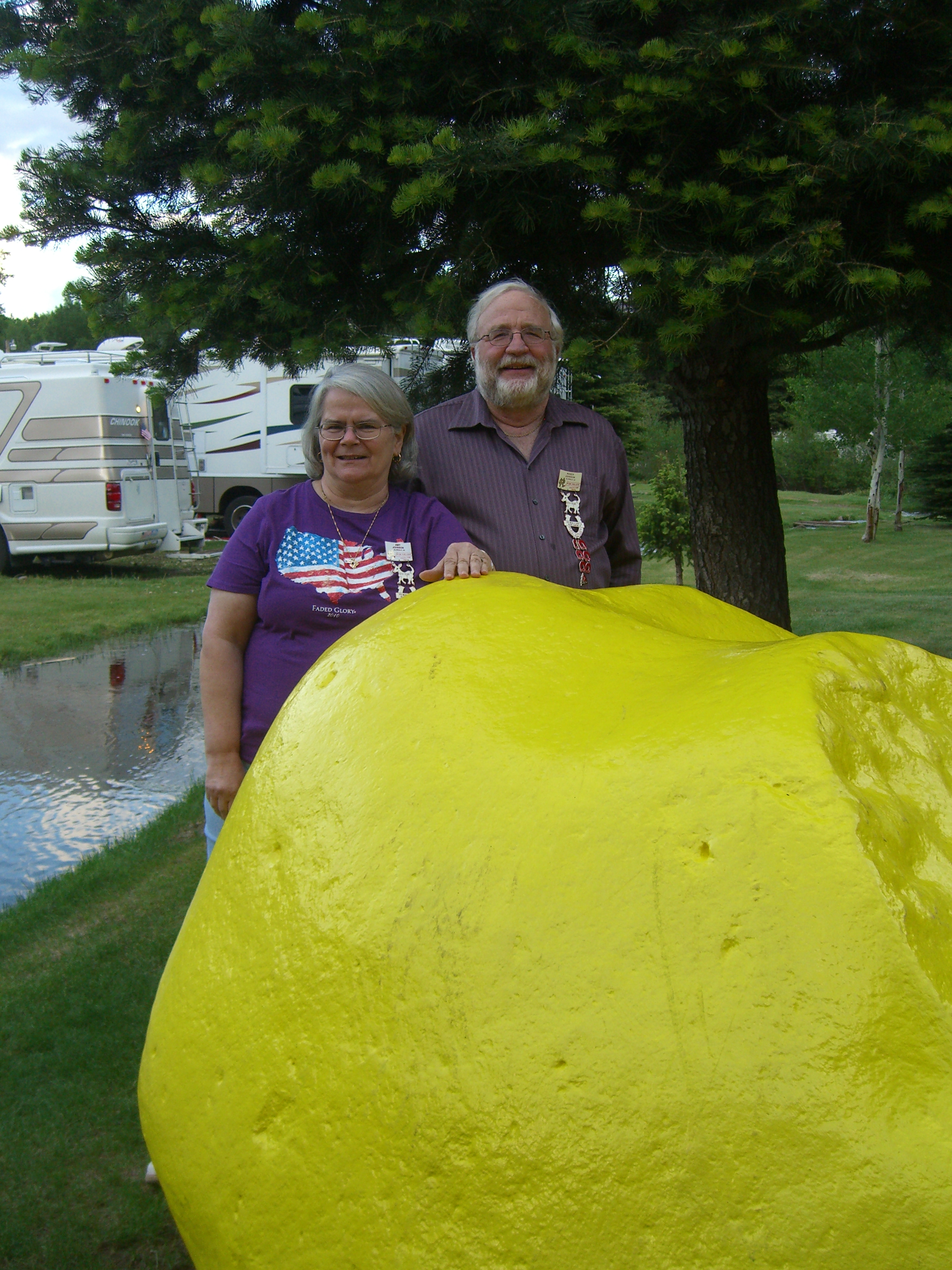 Roger & Amy Johnson yellow rock.JPG